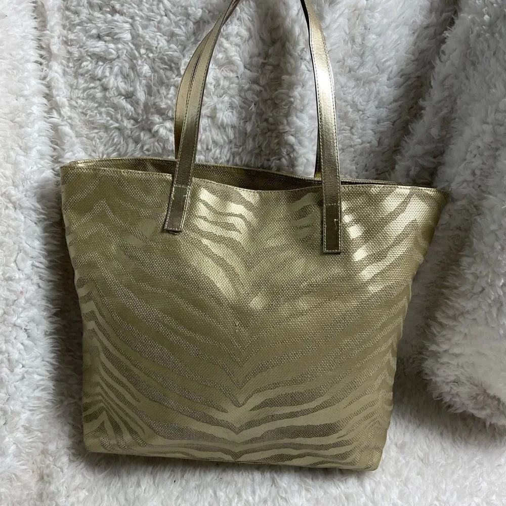 Michael Kors Metallic gold zebra print large tote gold tone hardwares and straps